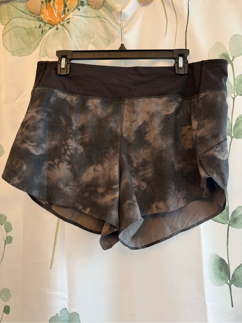 Athleta. Run with it shorts.  Size large